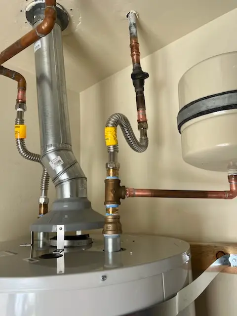 Water heater installation and plumbing repair in Filetown